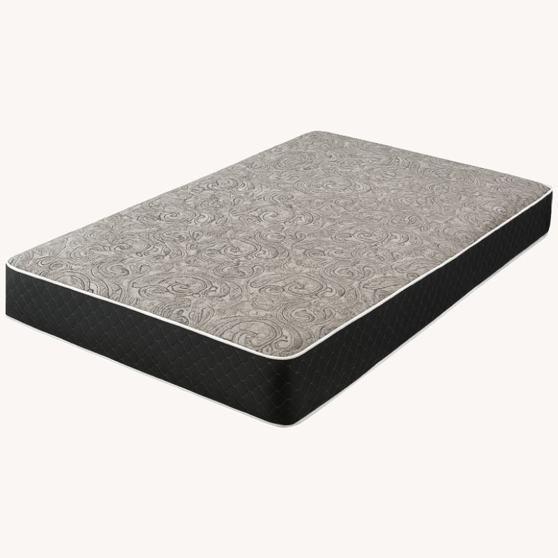 Mattress product shot showing grey swirl pattern fabric on white background