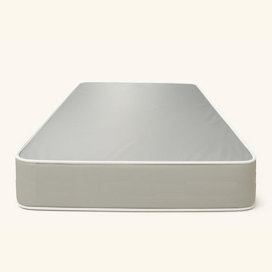Plain grey mattress on white studio background – SleepWell
