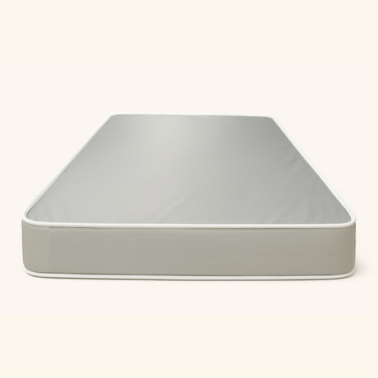 Plain grey mattress on white studio background – SleepWell