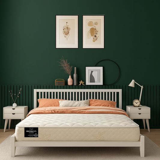 Brooklyn Standard mattress on white bed frame in bold green bedroom - buy in Winnipeg