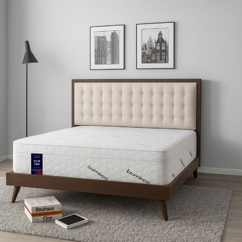SleepWell Plush Firm bamboo mattress on wooden frame with tufted headboard