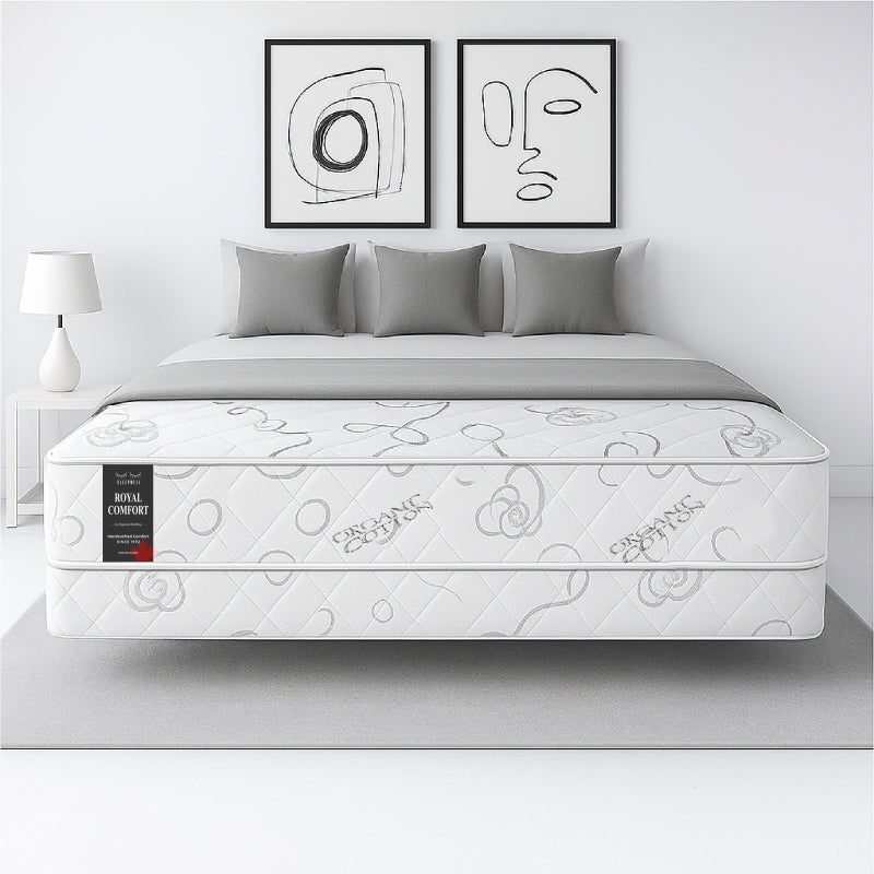 SleepWell Royal Comfort organic cotton mattress front view in minimal bedroom