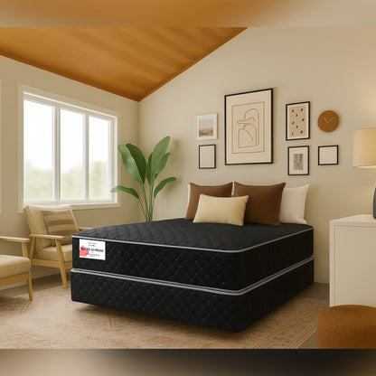 Sleep-O-Pedic black mattress in warm boho-style bedroom with gallery wall - buy in Winnipeg