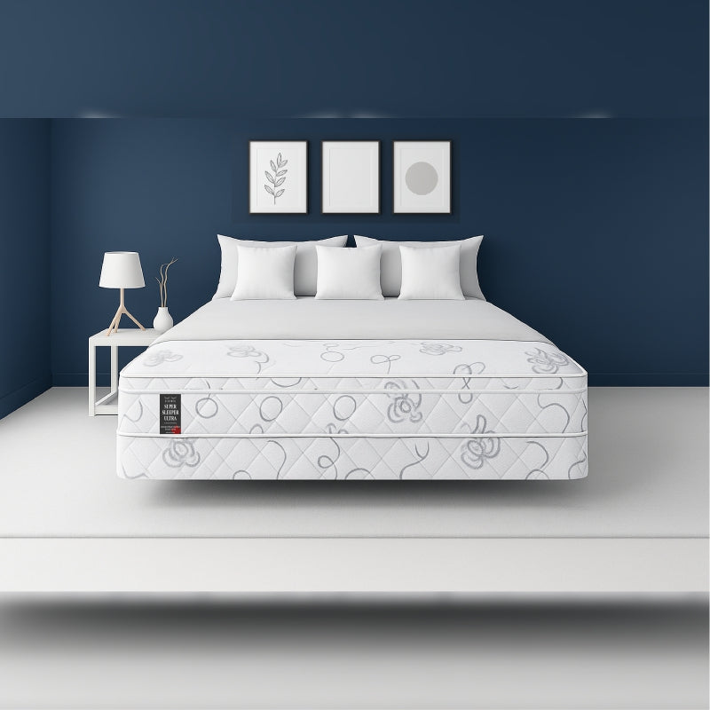 SleepWell Super Sleeper Ultra organic cotton mattress front view in navy bedroom