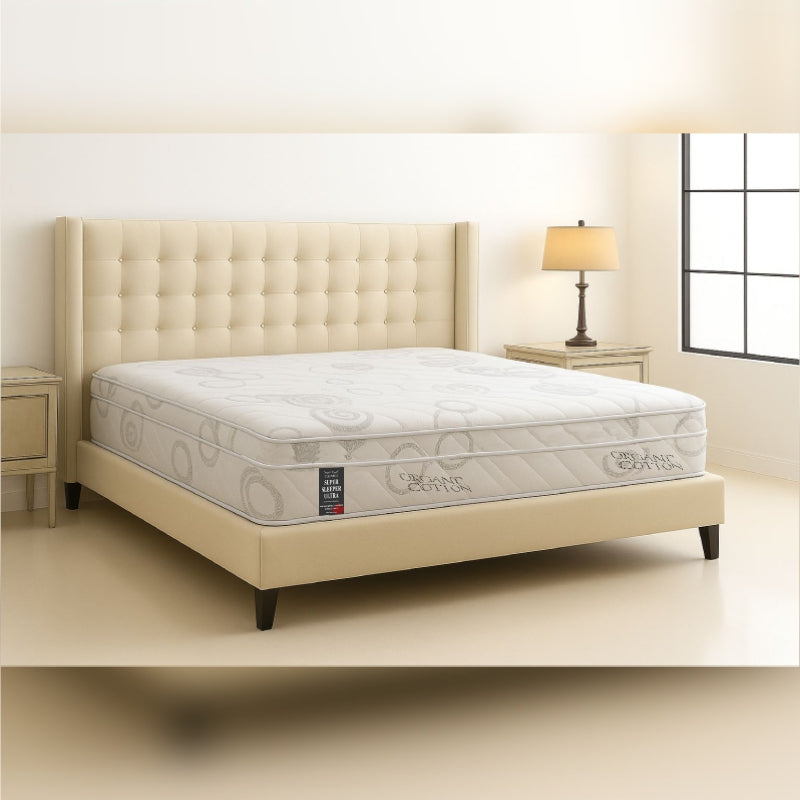 SleepWell Super Sleeper Ultra organic cotton mattress on tufted headboard bed