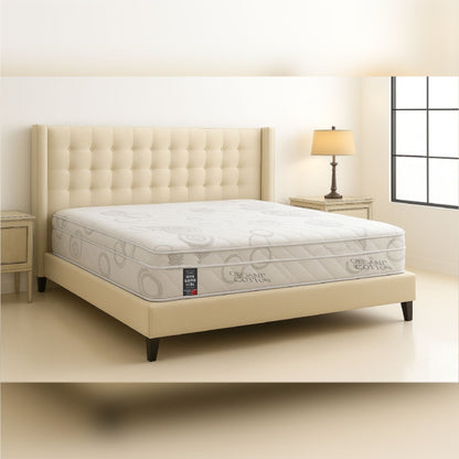 SleepWell Super Sleeper Ultra organic cotton mattress on tufted headboard bed
