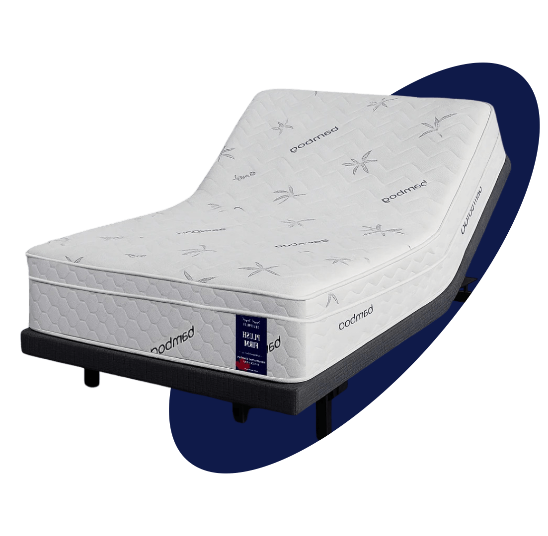 Adjustable mattress with quilted leaf-pattern cover on a dark gray adjustable base, reclined to show flexibility  like banboo fabric — Sleepwell Bedding.