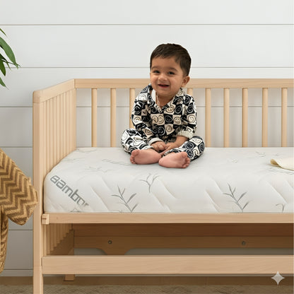 Bamboo crib mattress fitted inside a full-size baby crib