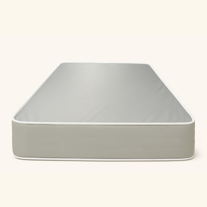 Plain grey mattress on white studio background – SleepWell